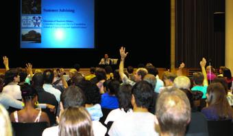 Dean of Advising Monique Rinere takes questions during a summer advising session for incoming students and their families in Lerner Hall.